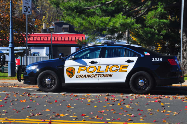 Orangetown police charged a woman with driving while intoxicated after reportedly pulling her over for using a cell phone.