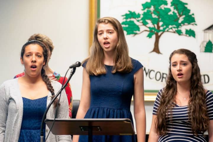Students sing during the May 30 Memorial Day tribute in Pleasantville.
