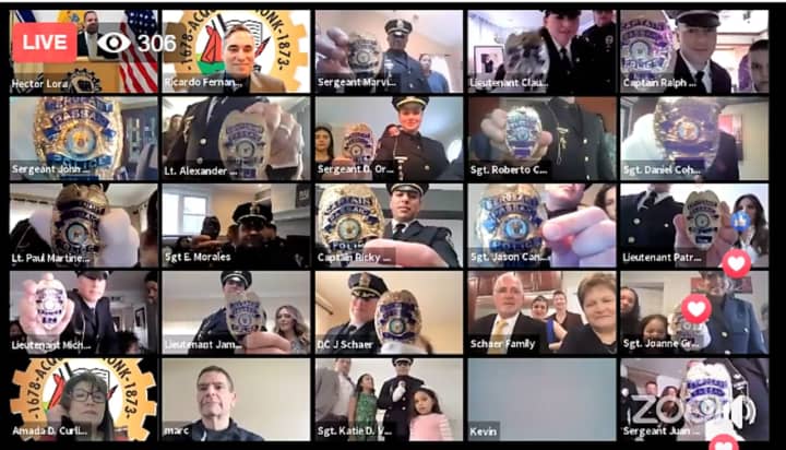 Passaic police show their new shields during virtual promotions on Monday.