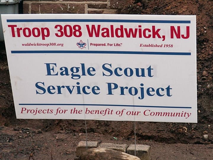 Waldwick boy scouts are at work to improve the public library.