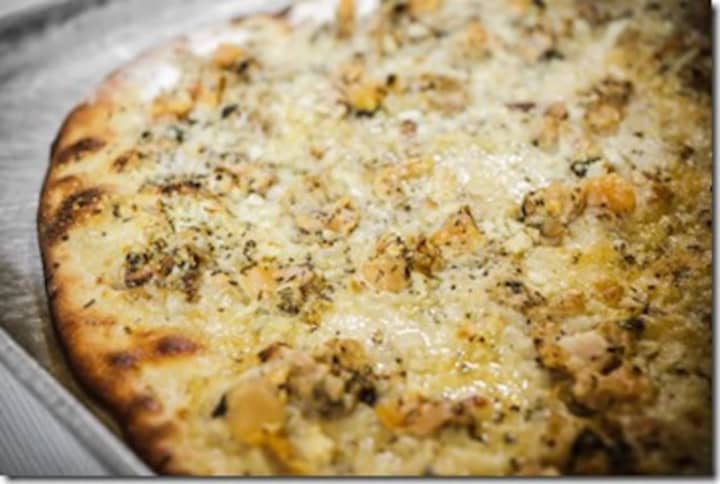Frank Pepe&#x27;s pizza is famous for its white clam pies.