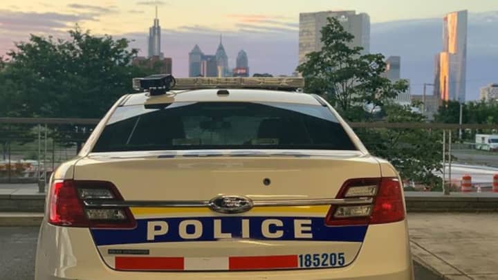 A Philadelphia police officer was injured by a &quot;large group of mostly young people&quot; in Center City Wednesday night, say officials.