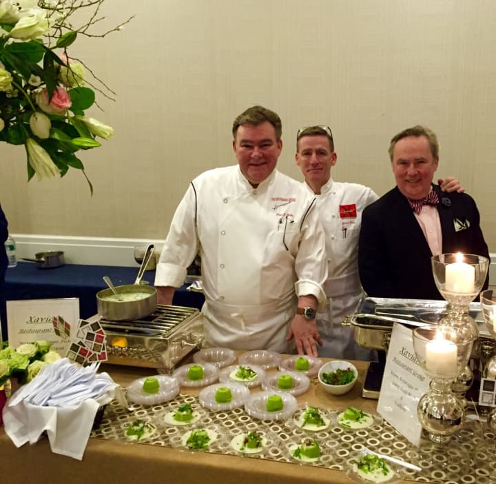 Chef Peter X. Kelly, left, with brothers James, middle, and Ned, right.