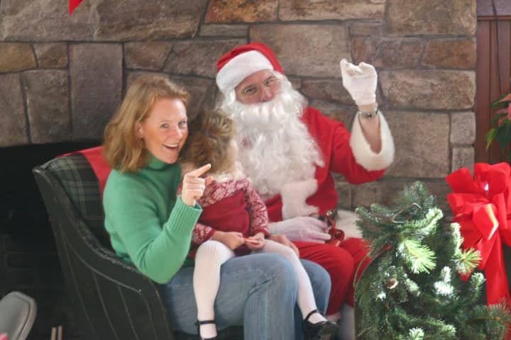 Photos with Santa are just part of the fun at the Round Hill Community House.
