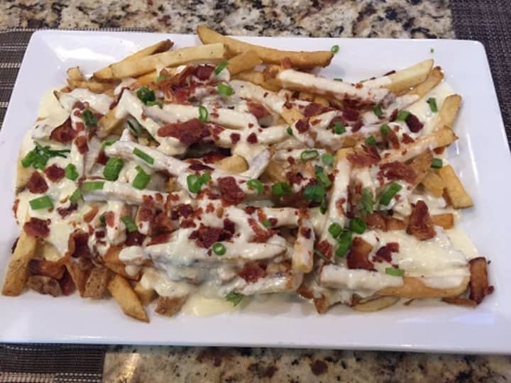 The blue cheese and bacon smothered fries at Barnum Publik House in Bridgeport.