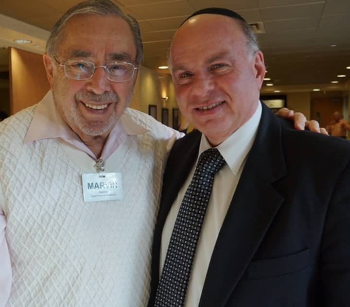 Marvin Eiseman and Rabbi Simon Feld at the annual meeting of the Jewish Home Family.
