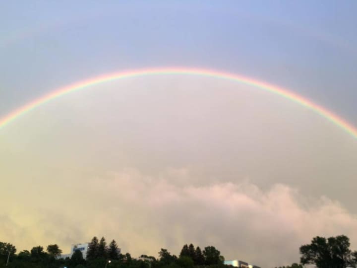 A full rainbow fills the sky over Danbury at about 8 p.m. Monday after heavy rains blew through the area.