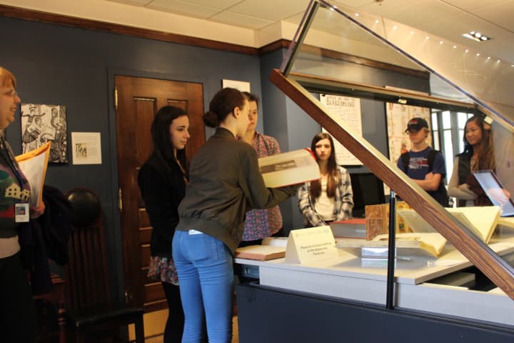 Students experience rare books from Pequot Library&#x27;s Special Collections during a school outreach initiative program. In order to host all of its school outreach programs, the library receives leadership grants.