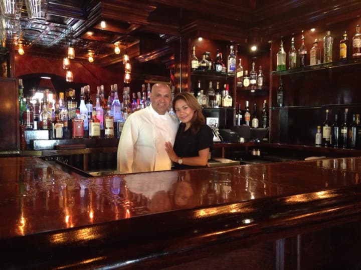 Ben Rivero with his girlfriend and bartender, Natalie Moscoso, behind the bar at Casual Habana&#x27;s new location in New Milford.
