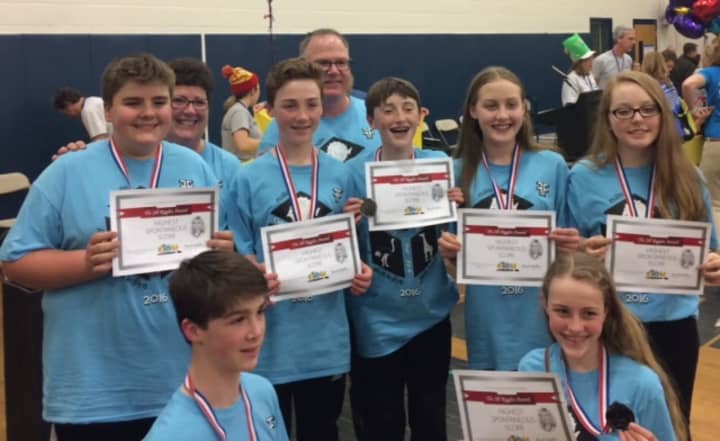 Members of the Rogers Park Middle School team, made up of students from several Danbury schools, show off their certificates after qualifying to participate in the Odyssey of the Mind&#x27;s World Finals last month in Iowa.