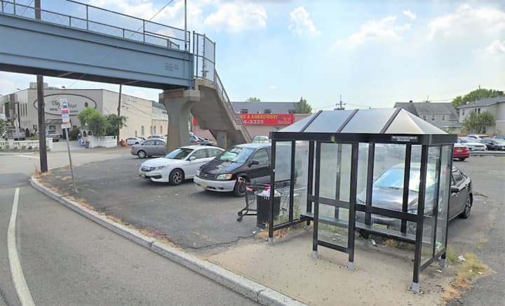 The woman told police she was waiting for a New York City-bound bus in the shelter on the side of the eastbound highway at 6th Street when she was robbed.
