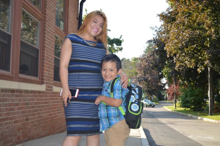 After a big hug from mom, this South Street School student heads to the first day of class in Danbury. 