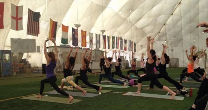 Folks taking yoga classes stretch at the Sports Underdome on Garden Avenue in Mount Vernon. The facility&#x27;s inflatable roof collapsed recently, apparently under the weight of snow from Saturday&#x27;s storm.