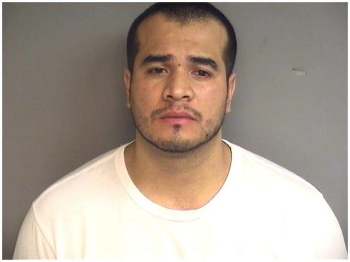 Stamford Police charged Alex Manriquez with sexual assault of a neighbor.