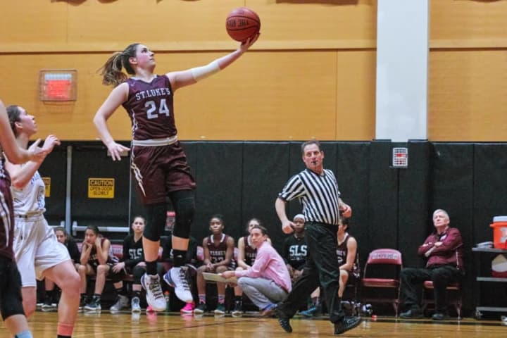 Maya Klein of St. Luke&#x27;s glides in for a basket during a win over Masters.