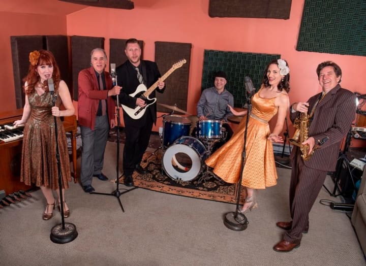 Swing band Eight to the Bar will be performing at the Trumbull Library.