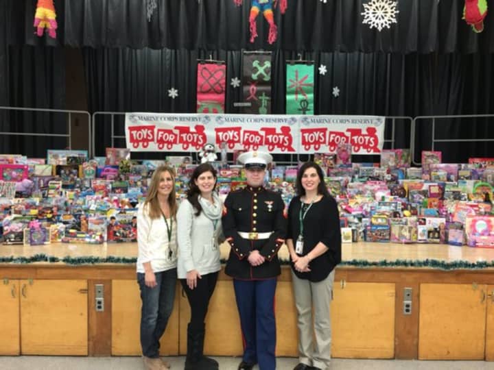 Brookside Elementary School&#x27;s Toys for Tots collection will help 900 local families in need, school officials said.