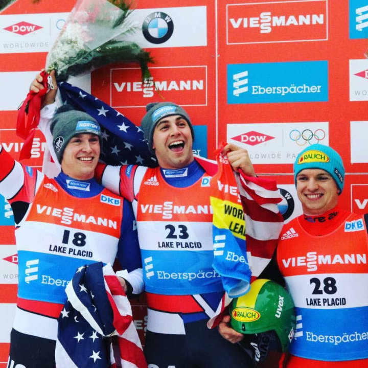 Tucker West, left, wins silver and his teammate Chris Mazdzer, center, wins gold at an event last season in Lake Placid.