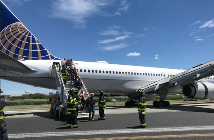 Passengers left the plane via a staircase.