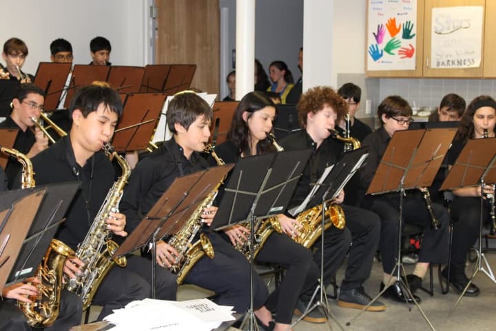 Scarsdale Middle School students performed for clients at the Open Arms Men&#x27;s Shelter in White Plains.