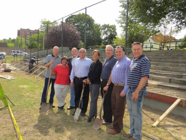 Eastchester Parks General Foreman Pat Anetta, Council members Theresa Nicholson, Joe Dooley, Glenn Bellitto, Luigi Marcoccia, Supervisor Anthony Colavita and Legislator Sheila Marcotte breaking ground at Parkway Oval Field.