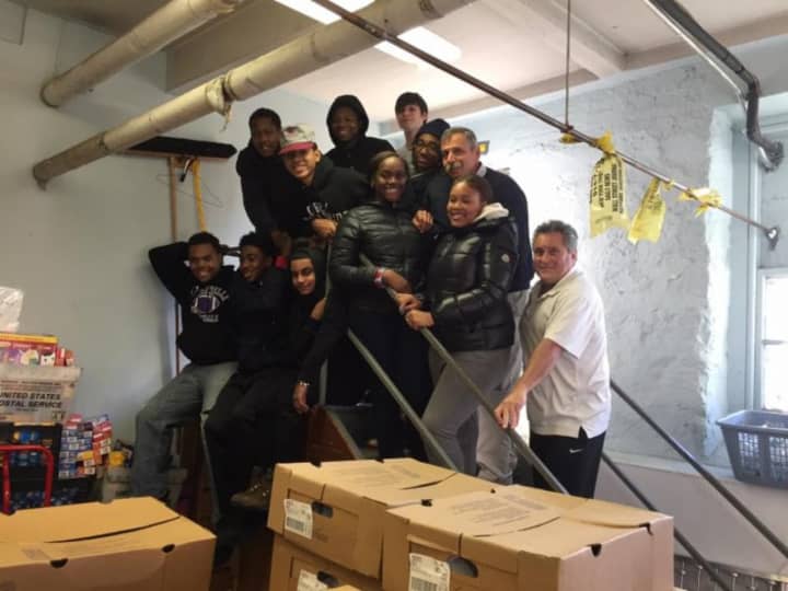 Campus Alternative high school students and faculty kicked off the holiday season by bringing food to needy families in New Rochelle.