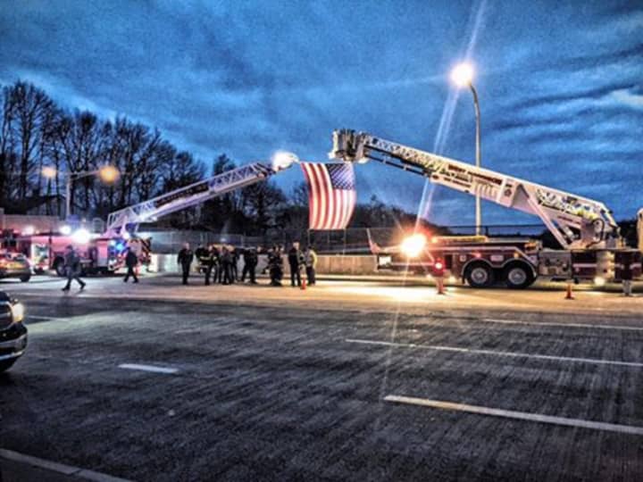 Monday night, the West Harrison and White Plains fire departments flew the American flag over Interstate-287 in tribute to NYPD Detective &amp; NY Air National Guard Tech Sgt. Joseph Lemm as a procession took his body from Orange County to Westchester.