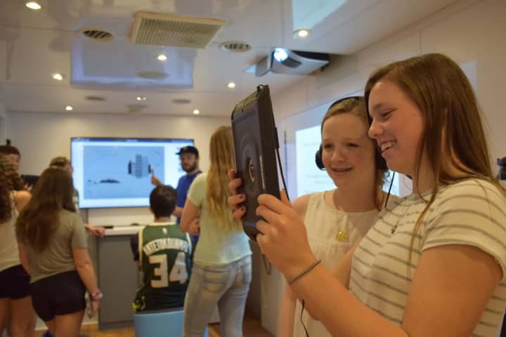 Bronxville Middle School eighth-graders put together different hidden clues and solved puzzles to solve a code and escape the iSchool Initiative’s Digital Learning Revolution Tour Bus.