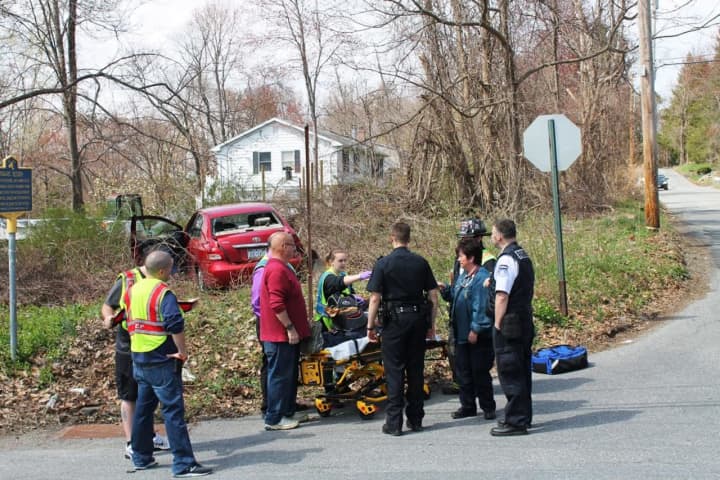 Emergency crews remove the injured driver.