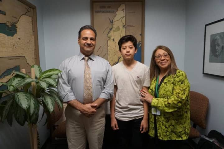 From left: Principal Anthony Bongo, student Darean Guzman and Counselor Martha Rodriguez