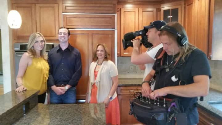 Grace Patalano, center, filming an episode of HGTV&#x27;s &quot;House Hunters.&quot;