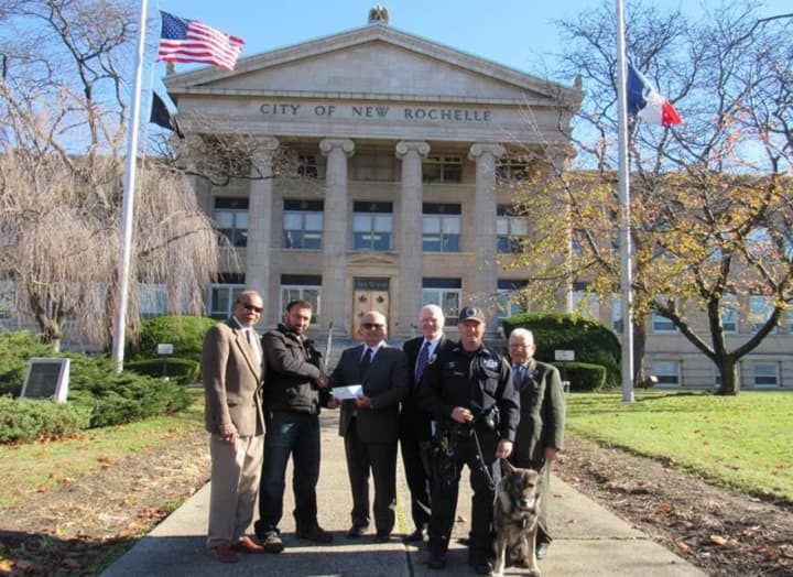 New Rochelle Police Commissioner Patrick J. Carroll and members of the New Rochelle Police Foundation were presented with a $5,000 donation to the Foundation from Ramiro Lopez of Ramiro’s Tree Service.