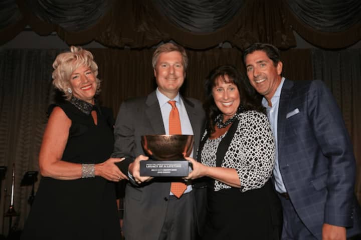 Left to right: Helen Lavelle, CEO/chief creative strategist at Lavelle Strategy Group, and host for the evening’s events, honoree John Osborn, Doreen Defabio Duska, governor of AAF District Two, and Jim Norton, global head of media.