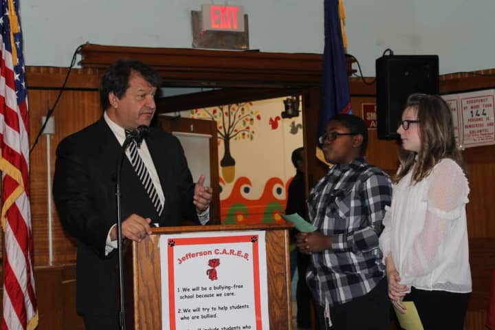 Sen. George Latimer and fifth-grade students Elijah Brown and Ember Stevens during his inauguration ceremony on Wednesday.