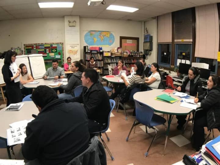 Isaac E. Young Middle School has begun offering free ESL classes for adults.