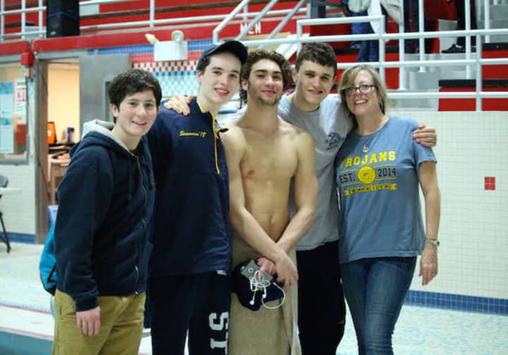 Weston High School took the top two spots at the SWC Diving Championships Wednesday. Pictured left to right: Nikita Moffley, Liam Simmons, Lucas Billig, Andrew Bell and Coach Jeanine Oburchay.