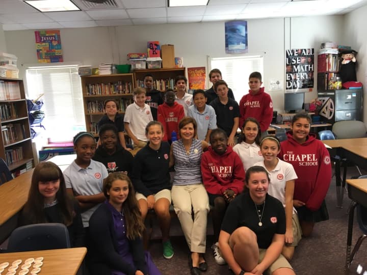 Mindy Corporon, founder of giveSevenDays.org shares the message &quot;Make a Ripple, Change the World!&quot; with seventh-graders from The Chapel School in Bronxville.