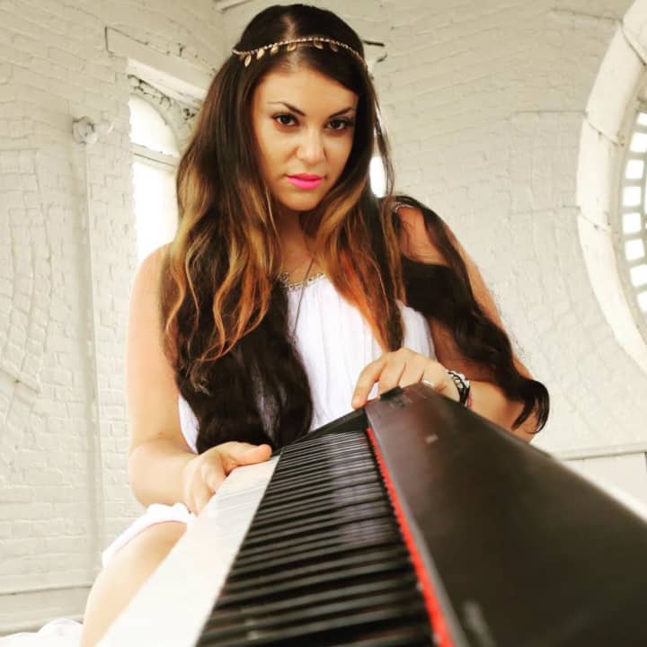 New Rochelle native Michelle DeAngelis will perform during this weekend&#x27;s Ridgefield Gone County BBQ Festival.
