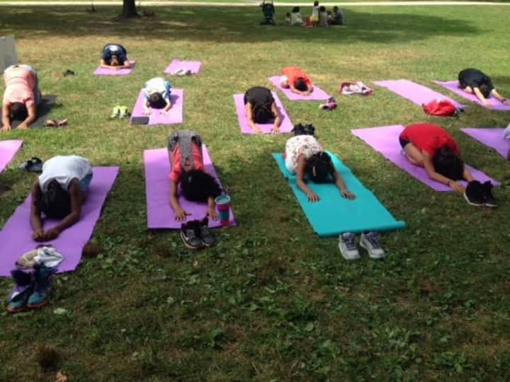 Yogis of all ages are welcome to breathe, stretch and relax at the Yoga Under The Stars event.