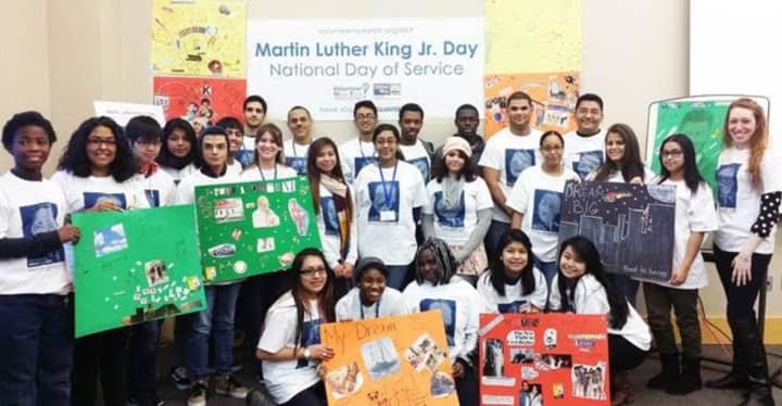 A group of volunteers celebrating after volunteering during last year’s Martin Luther King Jr. National Day of Service.
