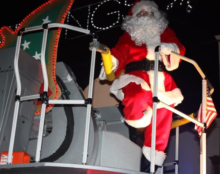 Mario Izzo as Santa Claus on the back of a Park Ridge Fire Department truck.