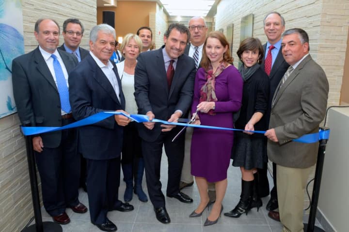 White Plains Hospital President and CEO Susan Fox and North Castle Town Supervisor Michael Schiliro cut the ribbon on White Plains Hospital&#x27;s new urgent care Medical and Wellness Center.