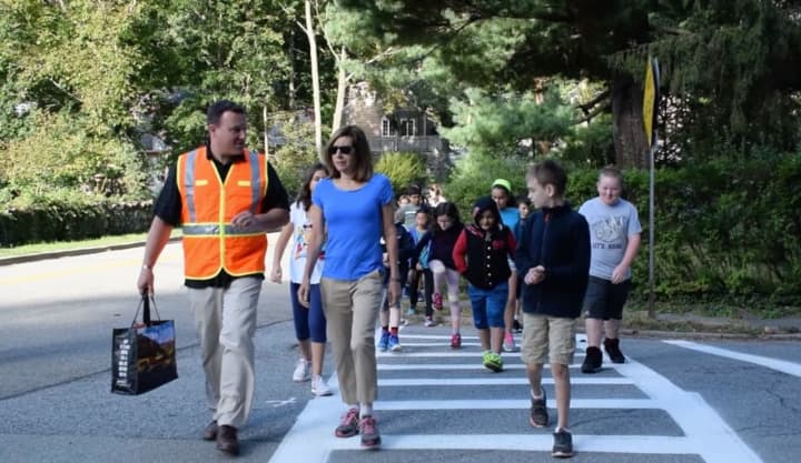 Pierre Van Cortlandt Middle School Assistant Principal Michael Plotkin and Croton-on-Hudson Village Manager Janine King rguided students on a safe walk to school.