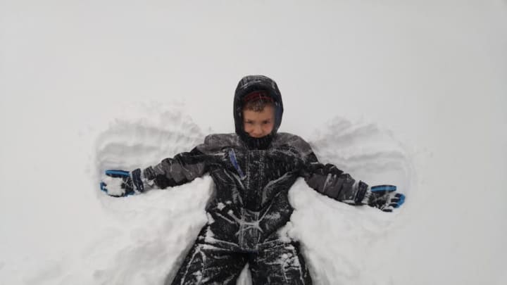 Making snow angels.