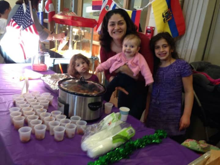 Anna Salerno with her daughters Bella, Amelia and Alexandra at her school&#x27;s International Night Food Fair with hundreds of meatballs.