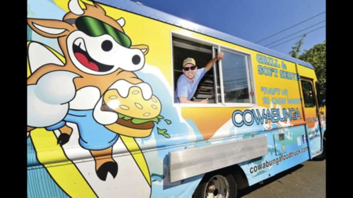 Benjamin Boger in his Norwalk-based Cowabunga food truck.