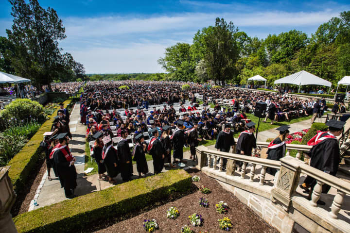 Fairfield University holds graduation ceremonies on the lawn on Sunday.