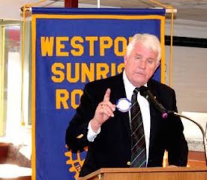 John Santa, chairman of the Malta American Association, speaks recently to the Westport Sunrise Rotary.