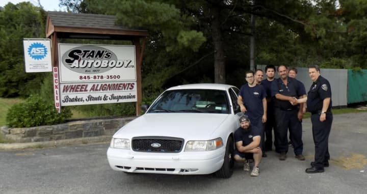 Stan&#x27;s Autobody employees repainted and removed all the rust from a &#x27;new&#x27; used car for the Putnam SPCA.