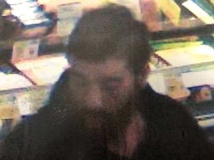 Police in Suffolk County released surveillance photos of a man who allegedly stole from a Long Island ShopRite.